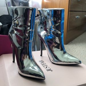 Silver high heel boots size 9